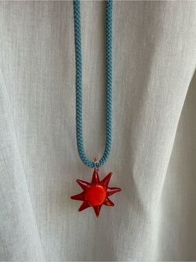 Red Glass Sun Pendant Necklace on Teal Cord